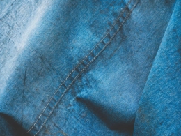 Acid wash marbled pattern on denim fabric