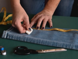 Hand-sanded whisker distressing on denim fabric