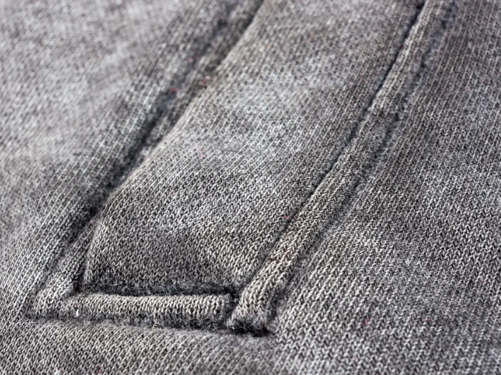 Close-up of heavyweight 380 GSM fleece fabric used for streetwear hoodies