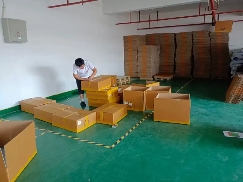 Packing area and export cartons ready for shipment at the warehouse