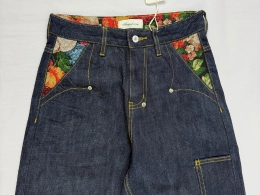 Raw selvedge denim jeans in a heavyweight fabric with visible selvedge edge