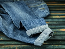 Raw selvedge denim cuff showing the red-line selvedge edge