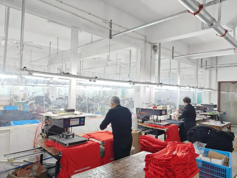 Screen printing carousel and drying tunnel in the print room