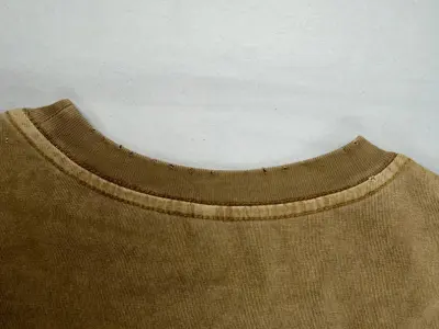 Vintage wash fade detail on hoodie collar