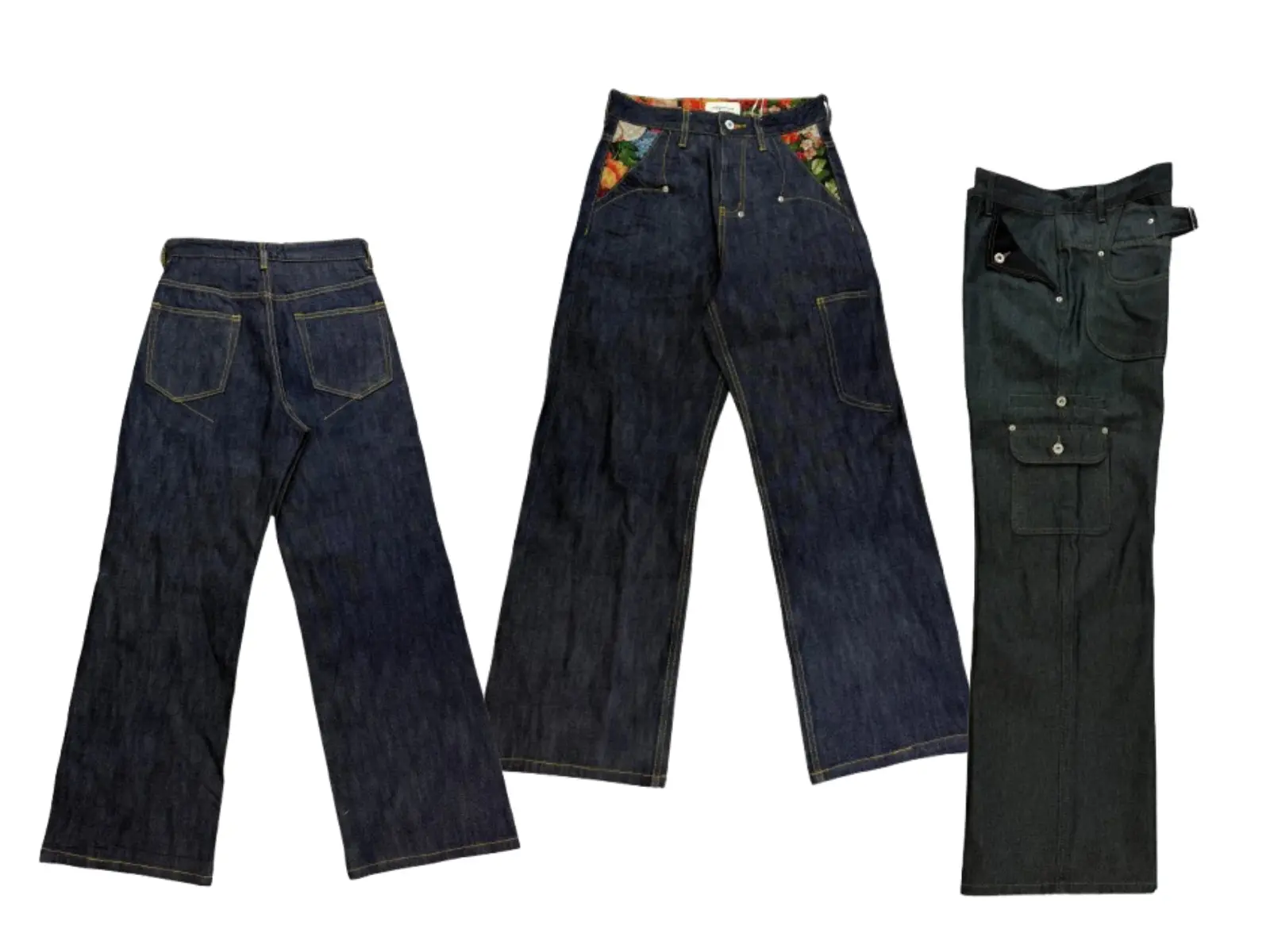 Denim jeans finished with acid wash, distressing and raw selvedge denim techniques