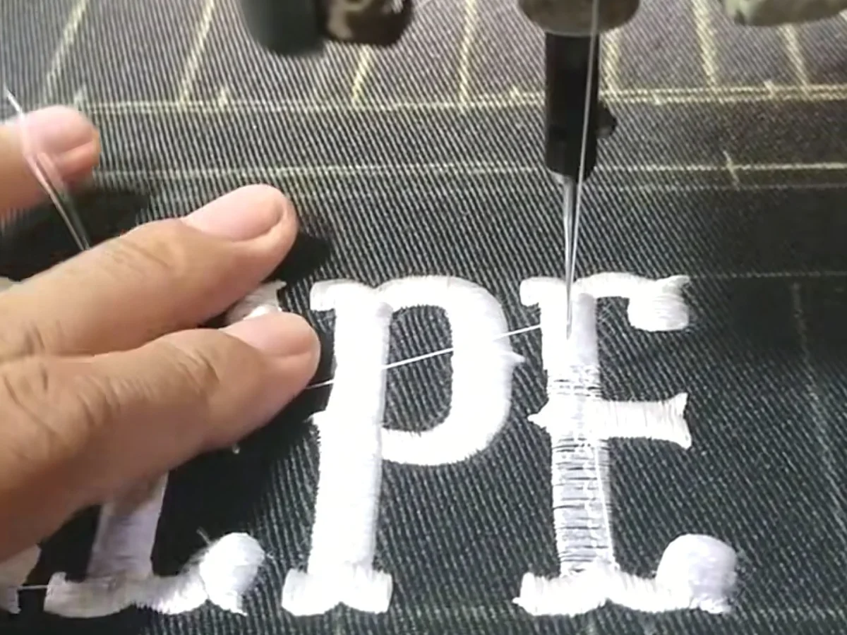 Light-colored raised print on dark cotton jersey