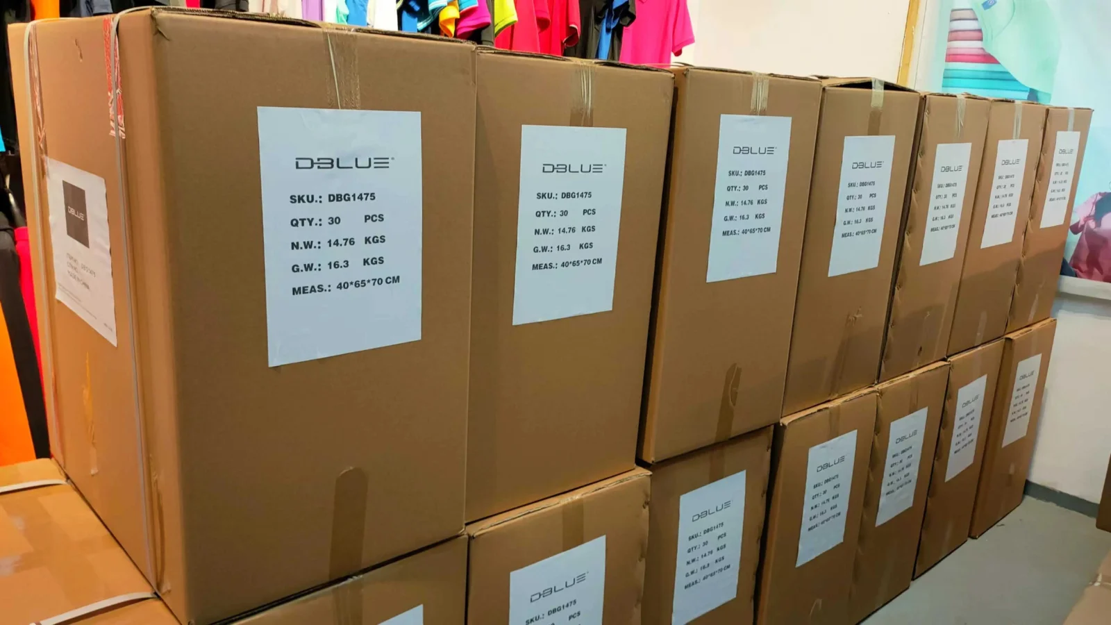 Packed garment cartons staged for dispatch at the FORGEMFG factory in Dongguan