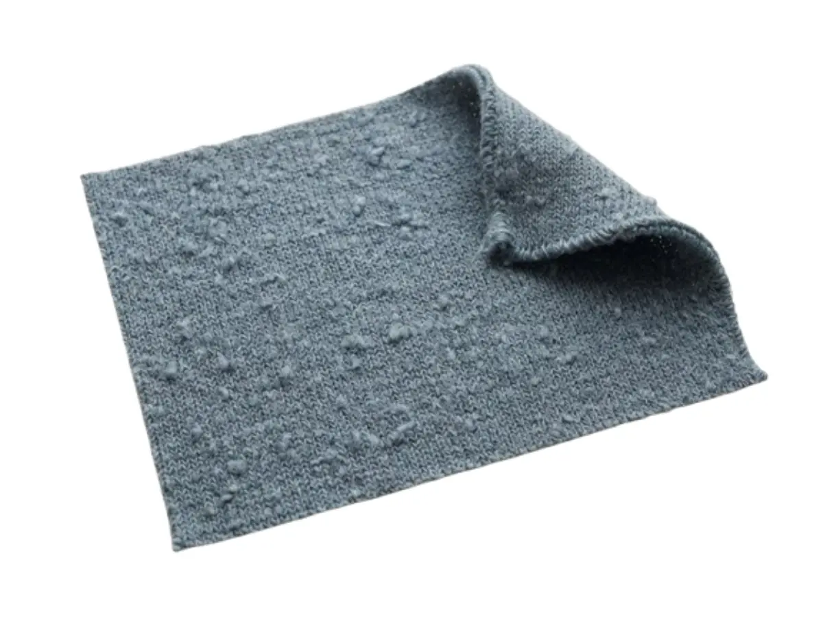 Heavy heather slub jersey swatch with pronounced thick-and-thin texture