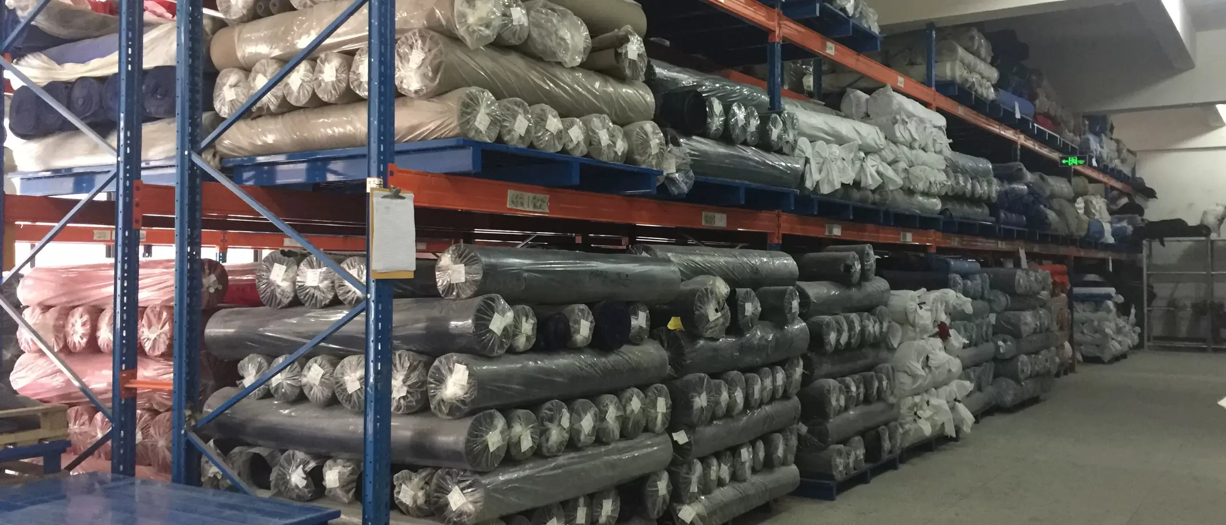 Heather grey slub jersey roll showing mottled fibers and thicker yarn sections