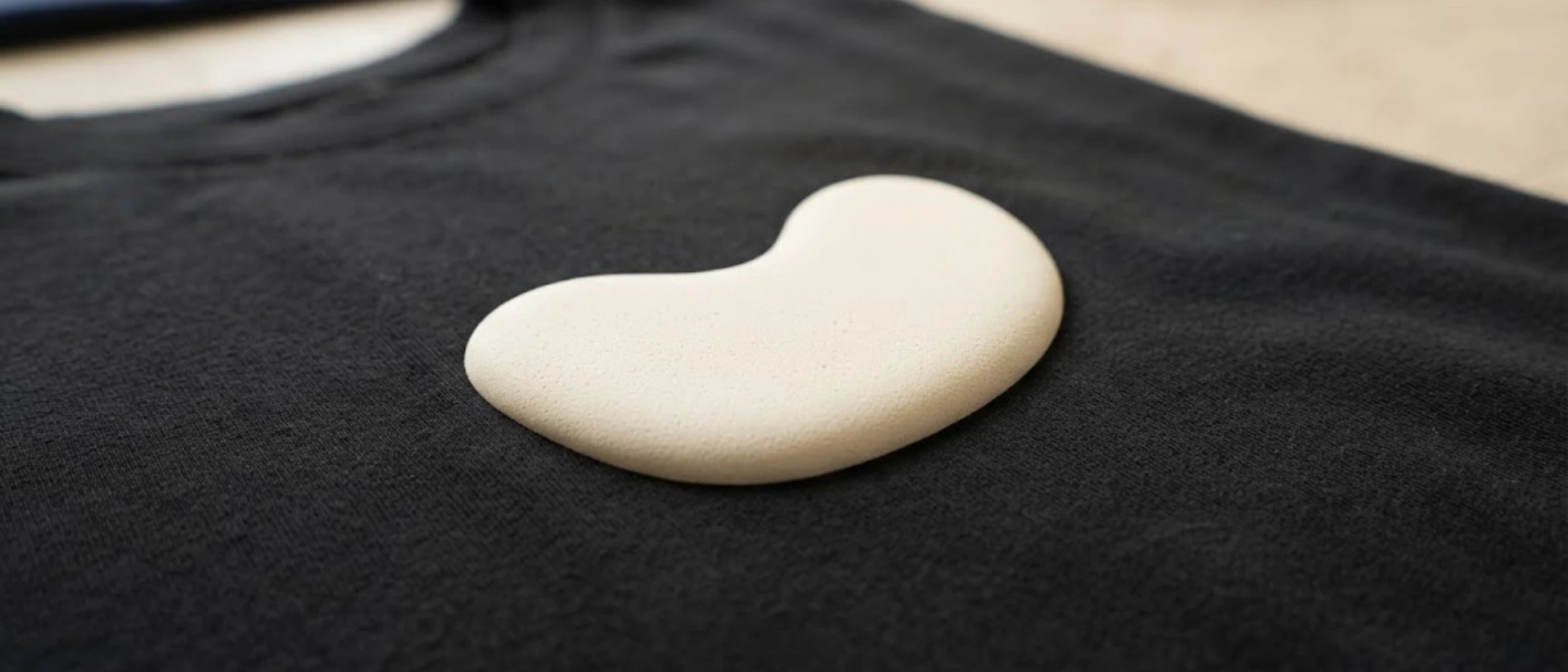 Raised ivory puff-print graphic on black cotton jersey